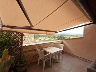 Un balcón o terraza de CA L'ENGRÀCIA