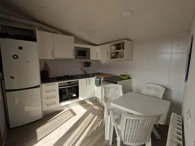 Una cocina o zona de cocina en CA L'ENGRÀCIA