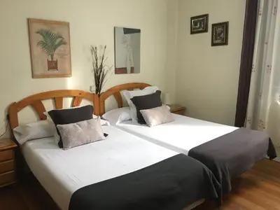 Cama o camas de una habitación en Pensión Leyre