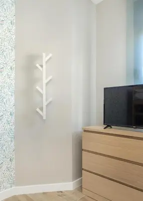 Una televisión o centro de entretenimiento en Los Piolets