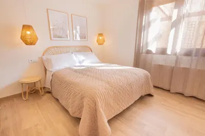 Cama o camas de una habitación en El sueño del Búho 3. Chimenea y terraza.
