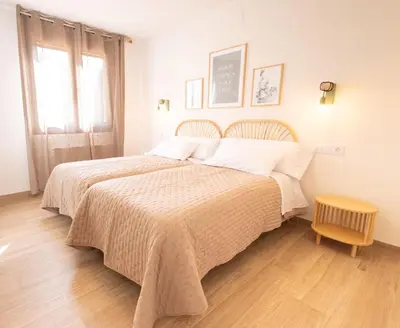 Cama o camas de una habitación en El sueño del Búho 3. Chimenea y terraza.