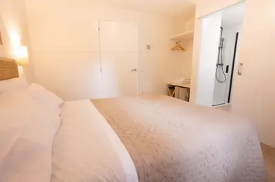 Cama o camas de una habitación en El sueño del Búho 5. Un dormitorio con chimenea