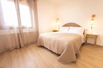 Cama o camas de una habitación en El sueño del Búho 1. Adaptado, chimenea y terraza