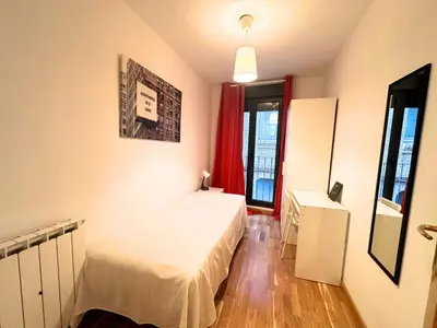 Cama o camas de una habitación en Dos Torres César Augusto - Larga temporada