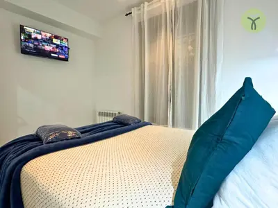 Cama o camas de una habitación en Dos Torres Tranvía