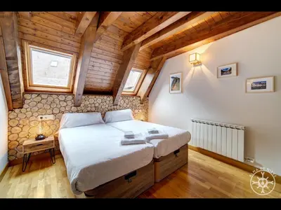 Cama o camas de una habitación en CASA GIRETA de Alma de Nieve