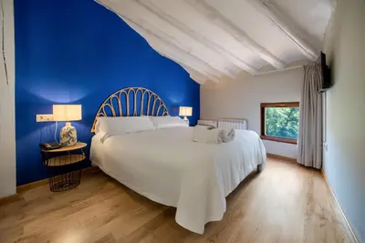 Cama o camas de una habitación en Hotel-Boutique by Gonzalo Sesma