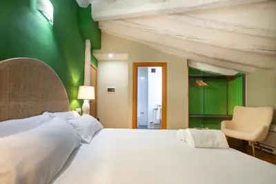 Cama o camas de una habitación en Hotel-Boutique by Gonzalo Sesma