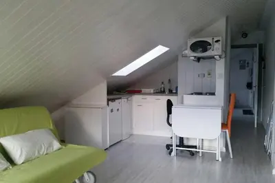Una cocina o zona de cocina en Ático vistas a pistas ideal familias