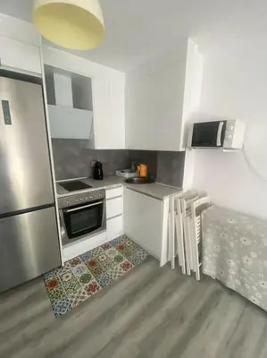 Una cocina o zona de cocina en Apart acogedor en Biescas para familias,vistas a la montaña