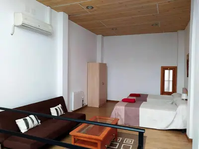 Cama o camas de una habitación en Casa Ramon y Cajal Alcañiz