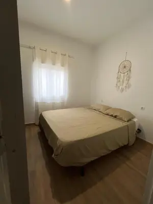 Cama o camas de una habitación en Alojamiento en Murchante