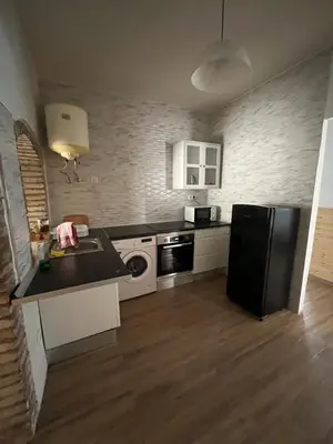 Una cocina o zona de cocina en Alojamiento en Murchante