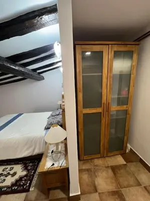 Cama o camas de una habitación en Apartamento dúplex en Sangüesa de 3 dormitorios y 2 baños