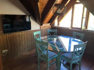 Una televisión o centro de entretenimiento en Casa Arties