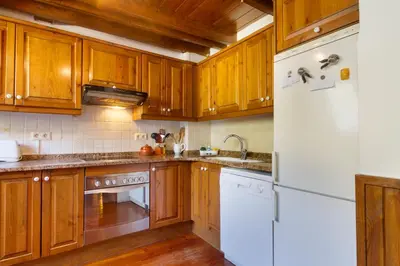Una cocina o zona de cocina en Casa Arties