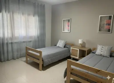 Cama o camas de una habitación en Apartamentos Manu