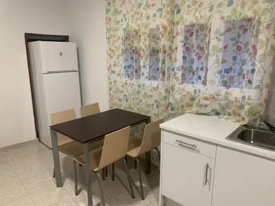 Una cocina o zona de cocina en Apartamentos Manu