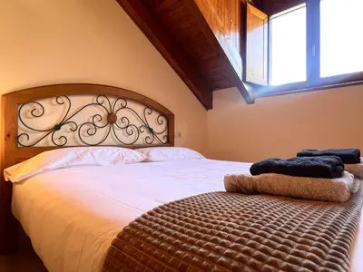 Cama o camas de una habitación en Dúplex el Torrent - L'Amfitriona