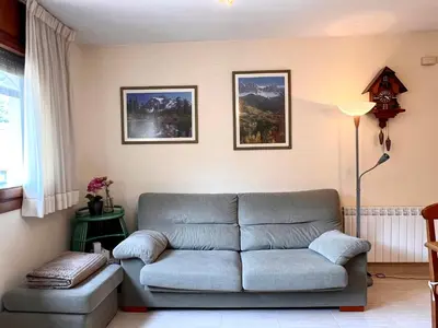 Zona de estar de Dúplex el Torrent - L'Amfitriona