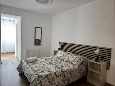 Cama o camas de una habitación en El pilar a 7 minutos