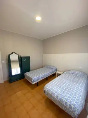 Cama o camas de una habitación en Apartamento ideal para familias