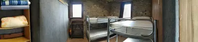 Cama o camas de una habitación en Albergue Casa Fumenal