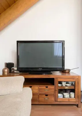 Una televisión o centro de entretenimiento en Los Manantiales de Villanua