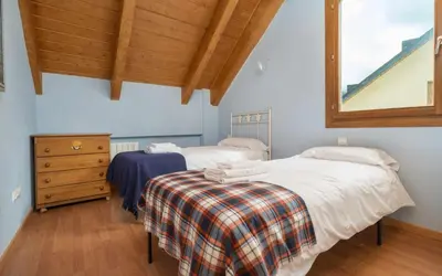 Cama o camas de una habitación en Los Manantiales de Villanua