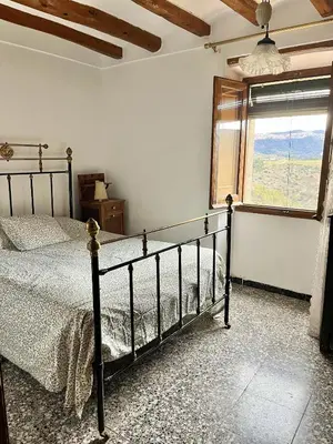Cama o camas de una habitación en Casa de Turisme Rural Riu Montsant