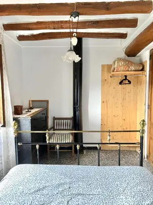 Cama o camas de una habitación en Casa de Turisme Rural Riu Montsant