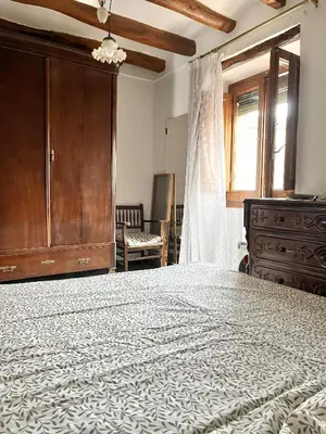 Cama o camas de una habitación en Casa de Turisme Rural Riu Montsant