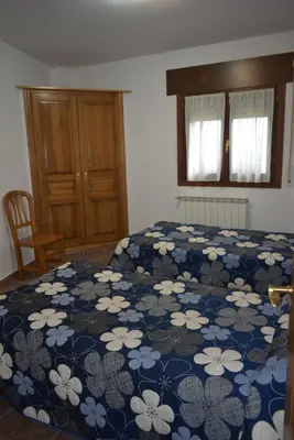 Cama o camas de una habitación en Apartamentos Casa Esperanza - Ordesa