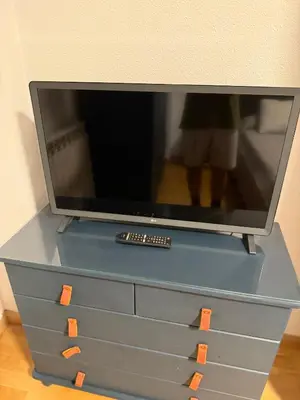 Una televisión o centro de entretenimiento en Apartamento céntrico con garaje