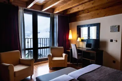 Cama o camas de una habitación en Hotel Valle De Izas