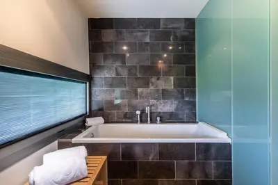Un baño de ​Exe Las Margas Golf