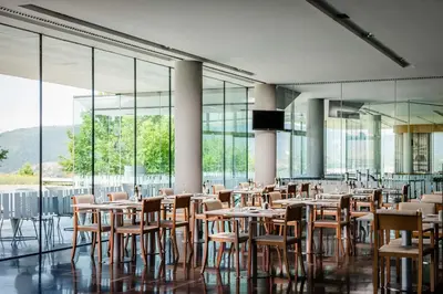 Un restaurante o sitio para comer en ​Exe Las Margas Golf