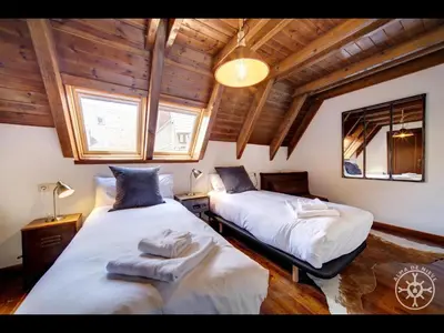 Cama o camas de una habitación en CASA TICOLET de Alma de Nieve