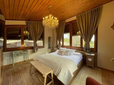 Cama o camas de una habitación en Touristic Ballonga Horses