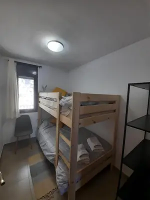Cama o camas de una habitación en APARTAMENT CASA MONTROIG