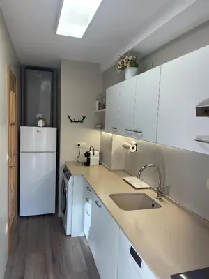 Una cocina o zona de cocina en Coqueto y céntrico en Panticosa
