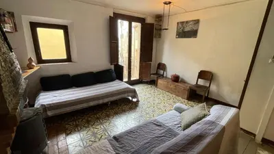 Cama o camas de una habitación en Maison de village proche de Margalef
