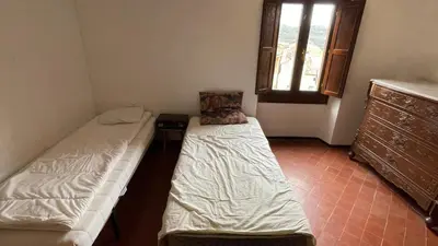 Cama o camas de una habitación en Maison de village proche de Margalef