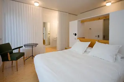 Cama o camas de una habitación en Hotel Aire de Bardenas