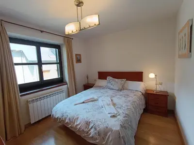Cama o camas de una habitación en InmoCyma Verdiblanco Familias-Valle de Benasque