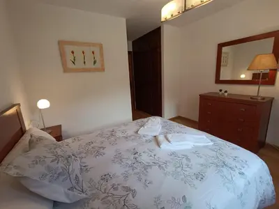 Cama o camas de una habitación en InmoCyma Verdiblanco Familias-Valle de Benasque
