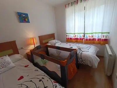 Cama o camas de una habitación en InmoCyma Verdiblanco Familias-Valle de Benasque