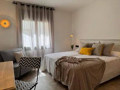 Cama o camas de una habitación en La Posada de Ruba