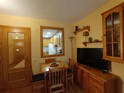 Una televisión o centro de entretenimiento en InmoCyma Montañas mágicas-Benasque